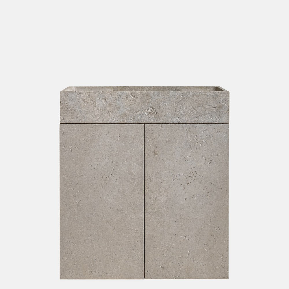 Minimalist stone bathroom vanity cabinet with integrated sink and natural textured finish