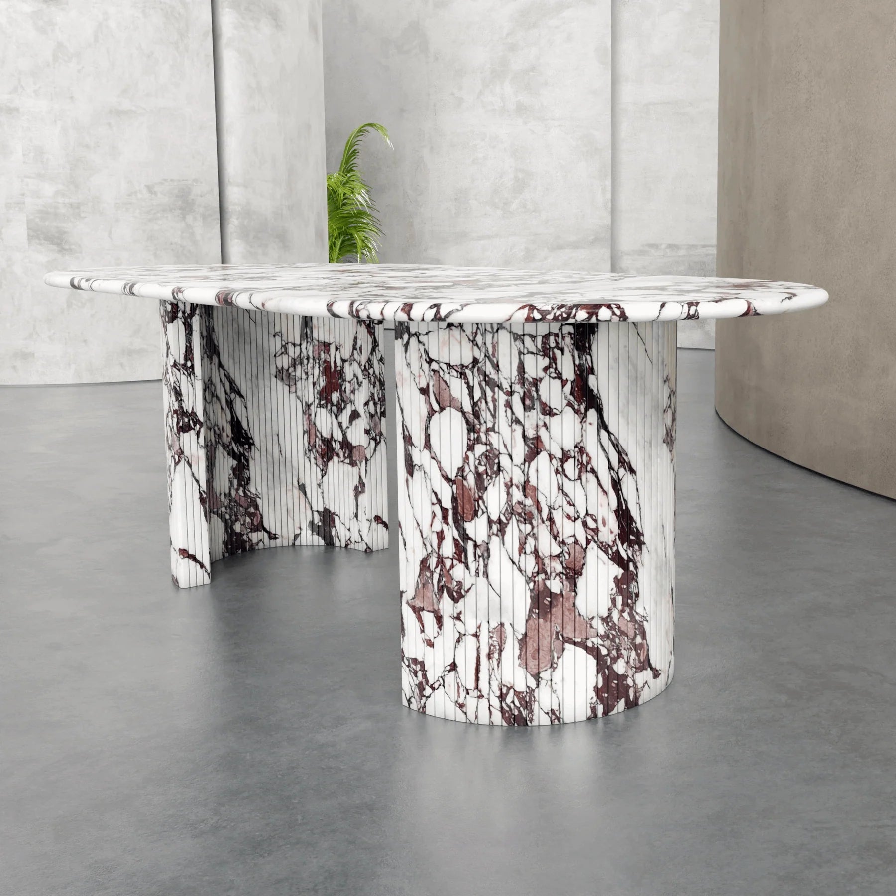 Anzio Calacatta Viola marble dining table with dramatic red and white veining viewed from angle