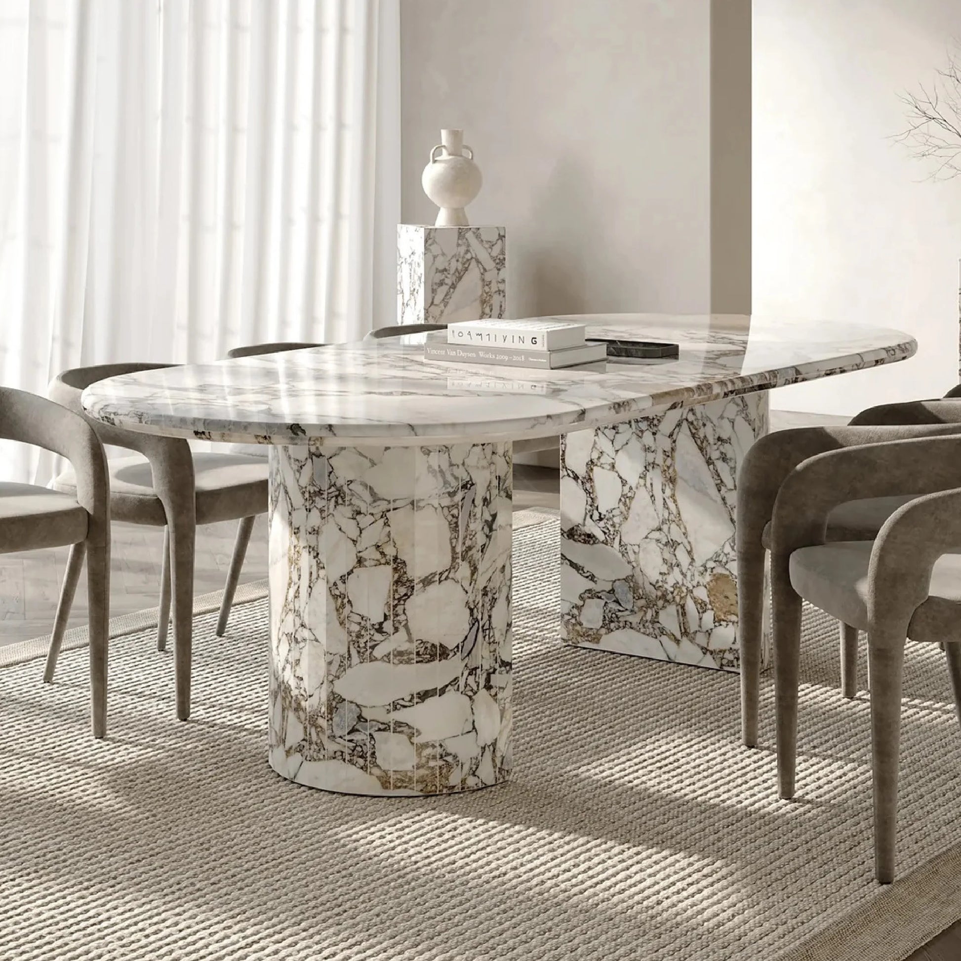 Anzio Calacatta Viola marble dining table in luxury dining room interior with upholstered chairs