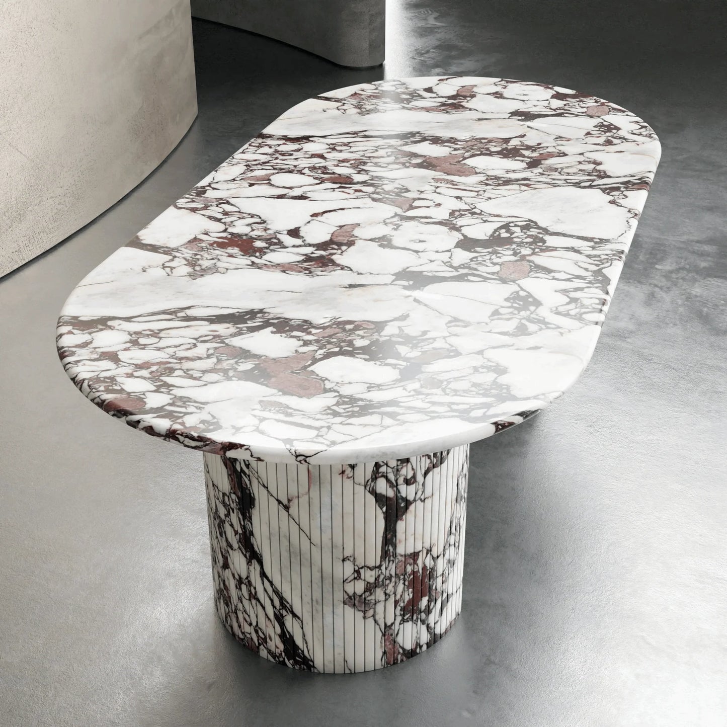 Anzio Calacatta Viola marble dining table showing sculptural base and oval marble top with dramatic burgundy veining