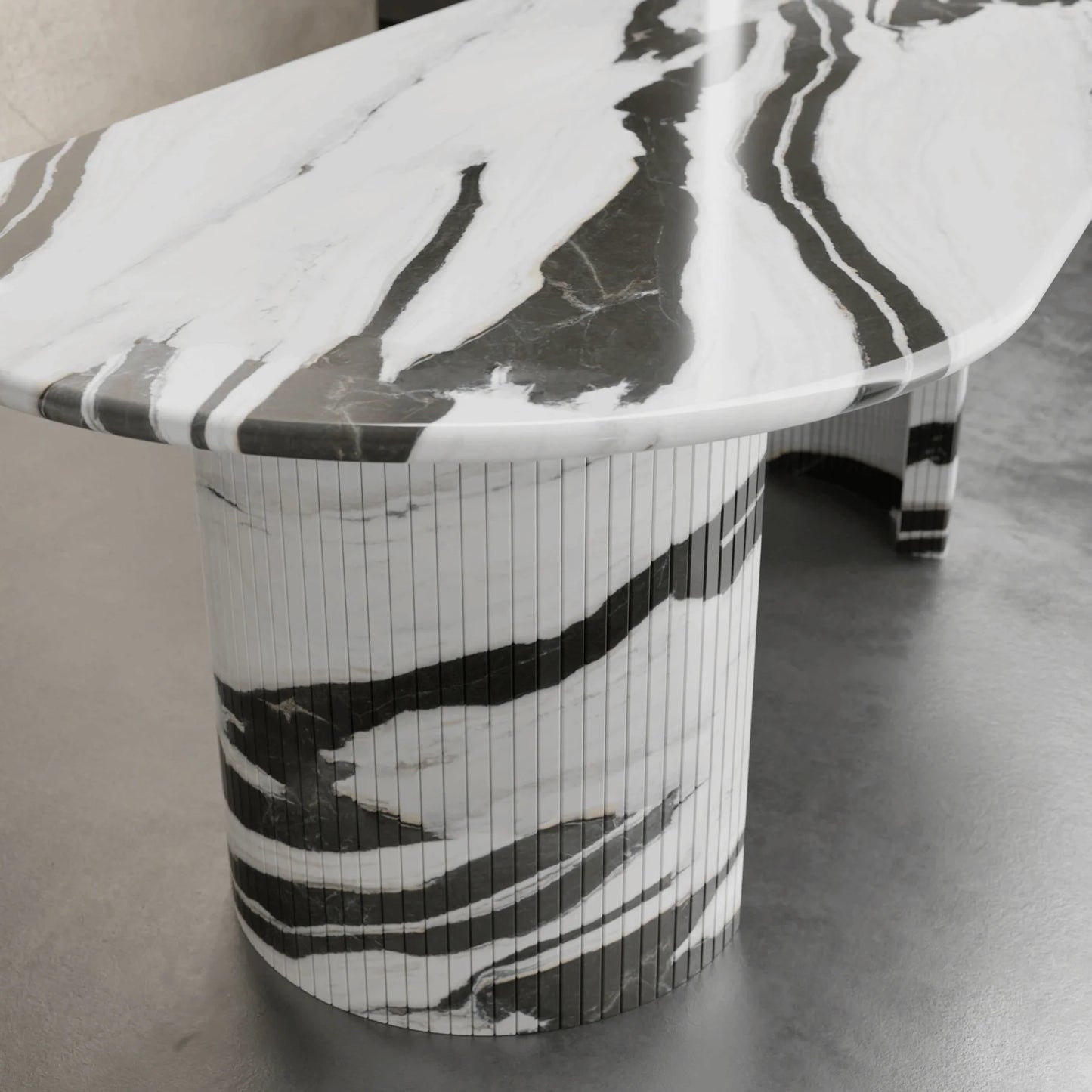 Detail of Anzio panda marble dining table showing bold black and white natural stone veining