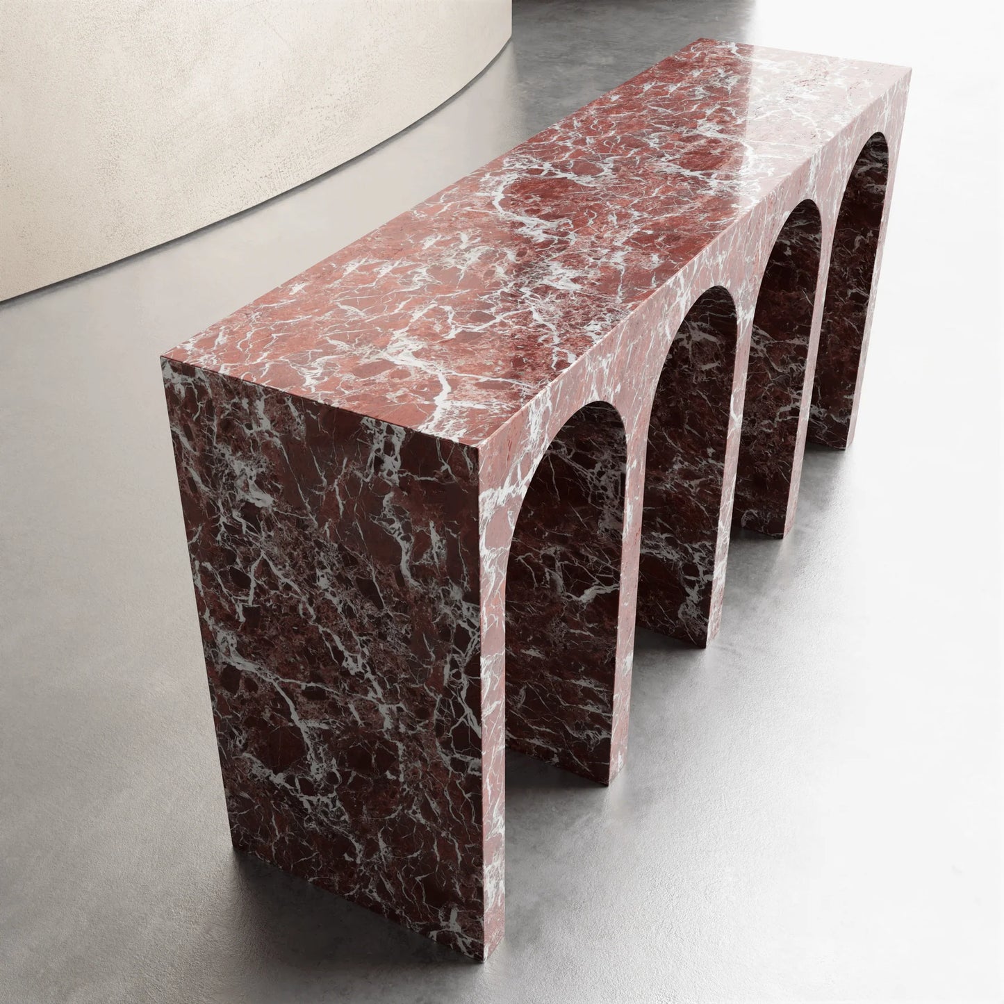 Arca console table in Rosso Levanto marble with sculptural arches