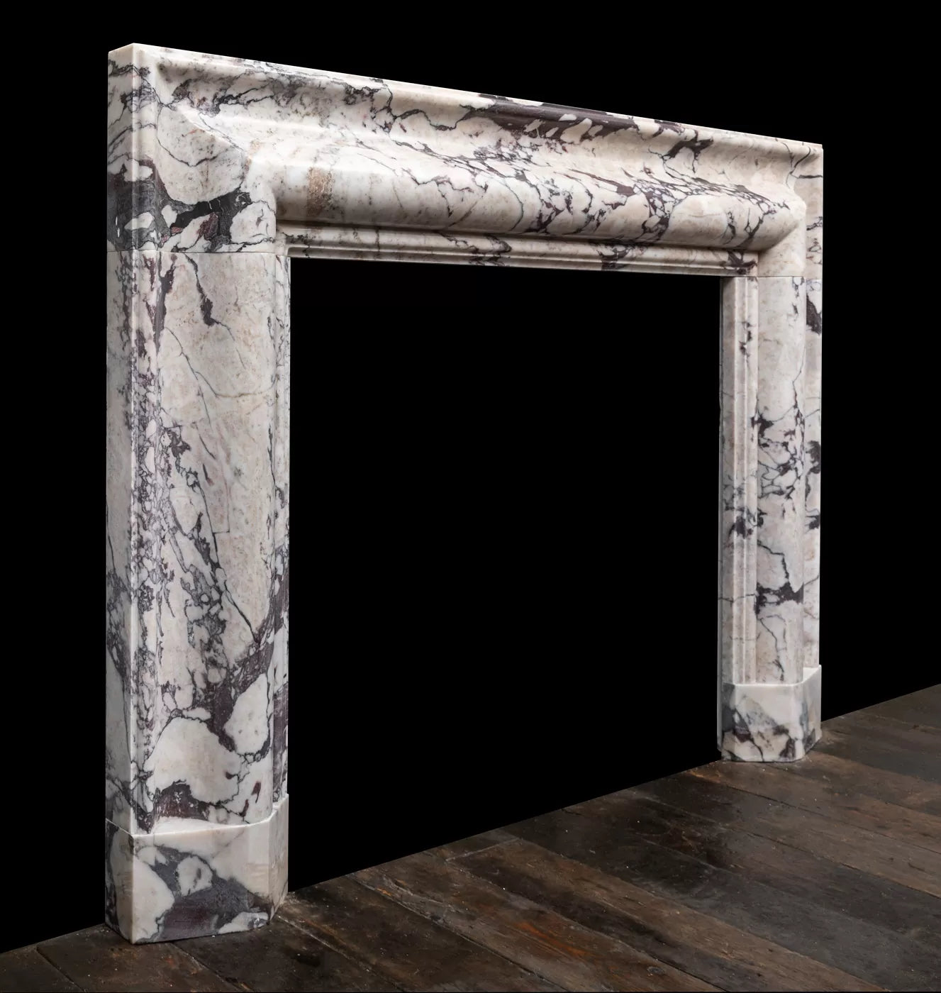 Breccia marble bolection fireplace surround by Eden Stone Designs