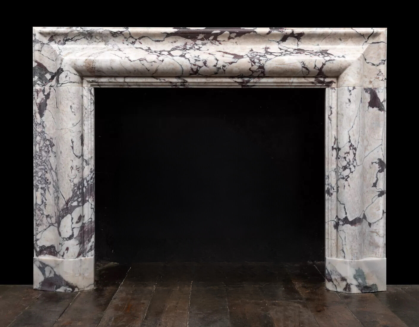 Breccia marble bolection fireplace surround by Eden Stone Designs