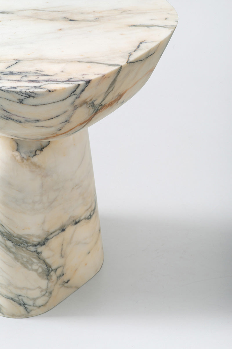 Capri marble side table detail showing natural stone veining and sculptural design by Eden Stone Designs