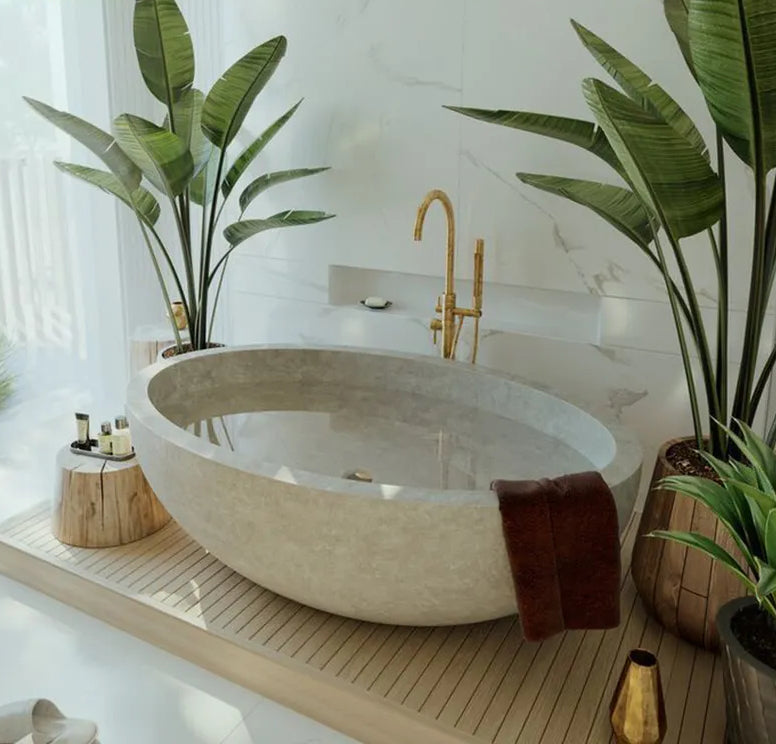 Cremona travertine freestanding bathtub in spa inspired luxury bathroom Eden Stone Designs