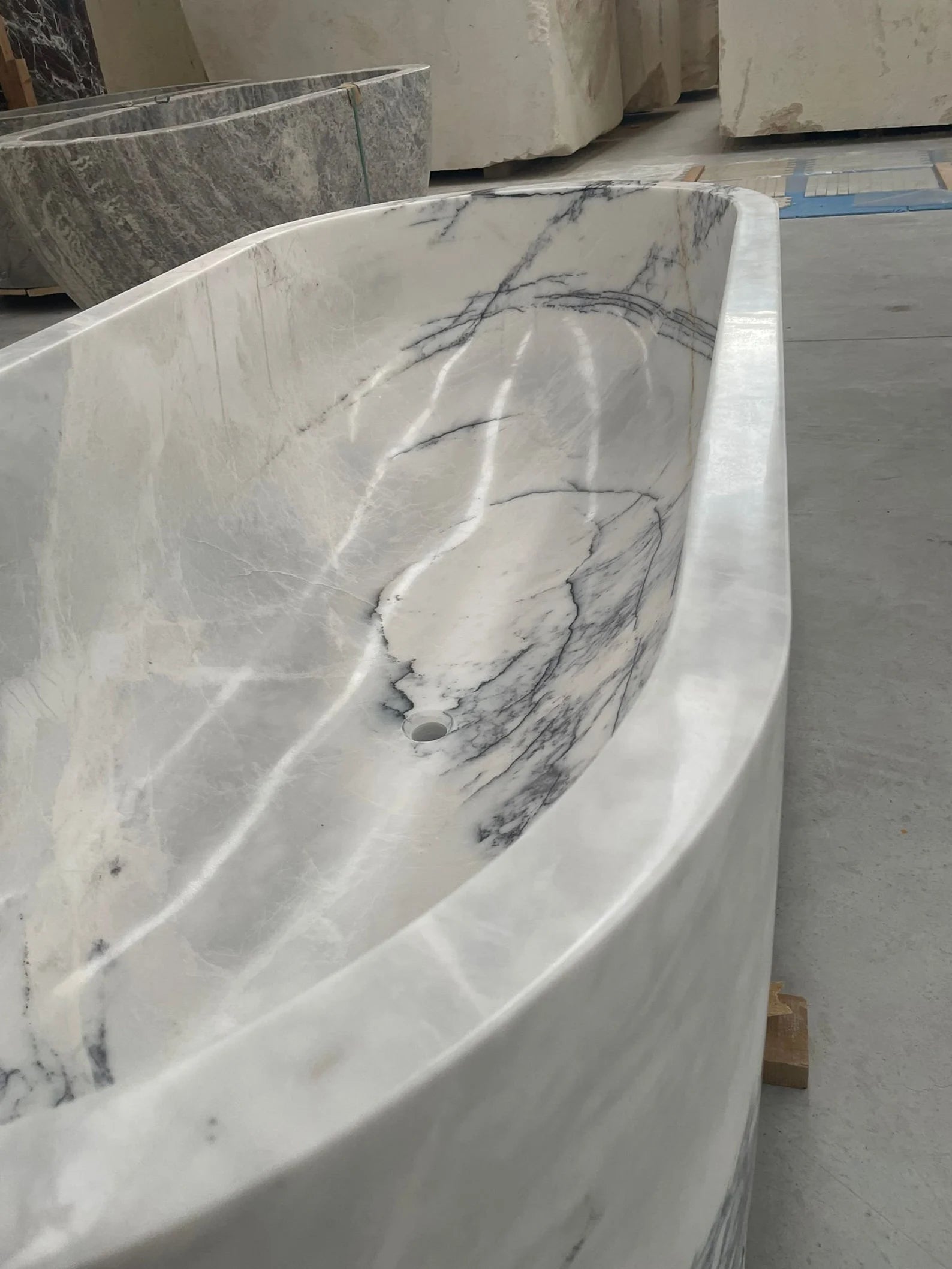 Calacatta marble freestanding bathtub interior detail by Eden Stone Designs