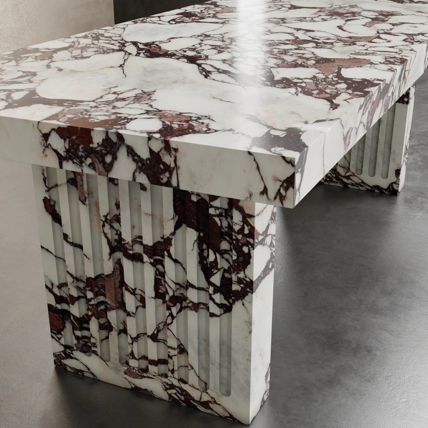 Siena marble dining table detail by Eden Stone Designs luxury natural marble dining table with fluted sculptural base and dramatic red veining