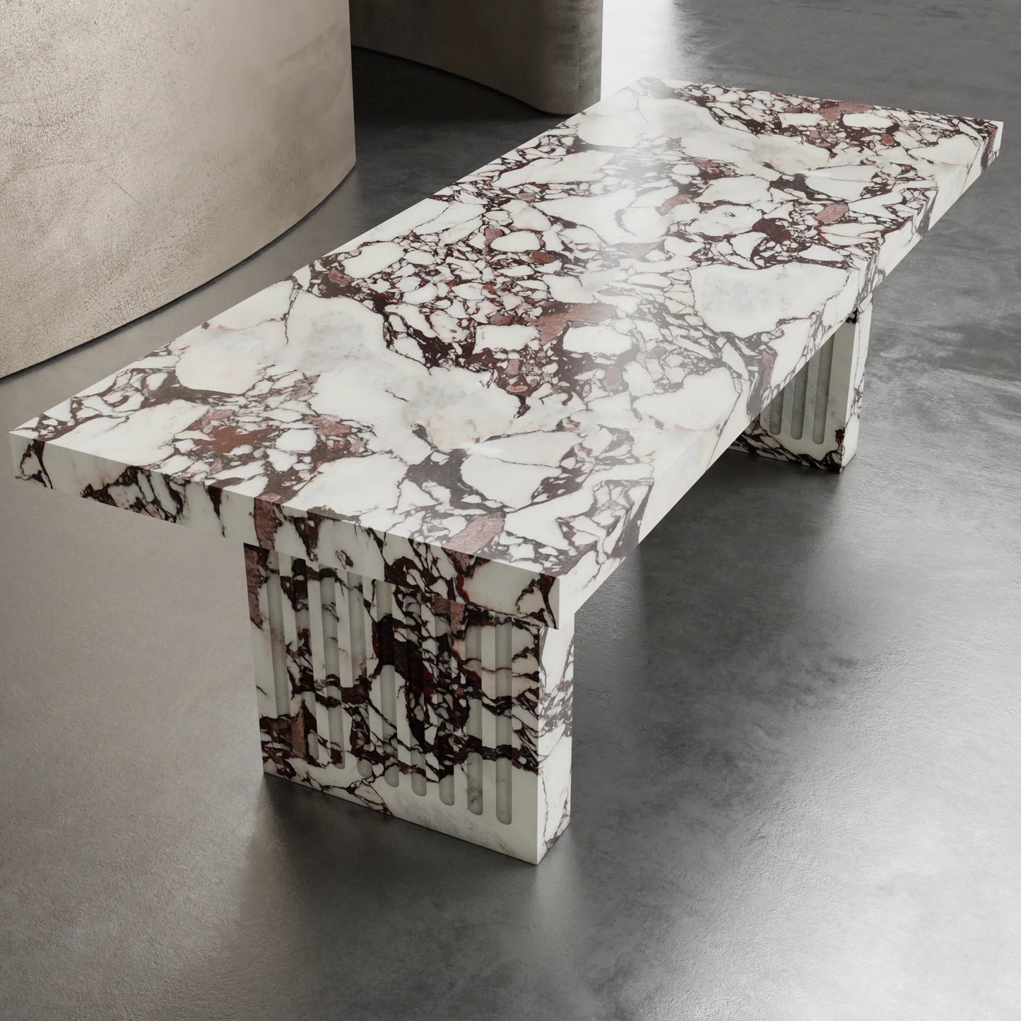 Siena marble dining table by Eden Stone Designs luxury marble dining table with sculptural fluted base and dramatic natural veining