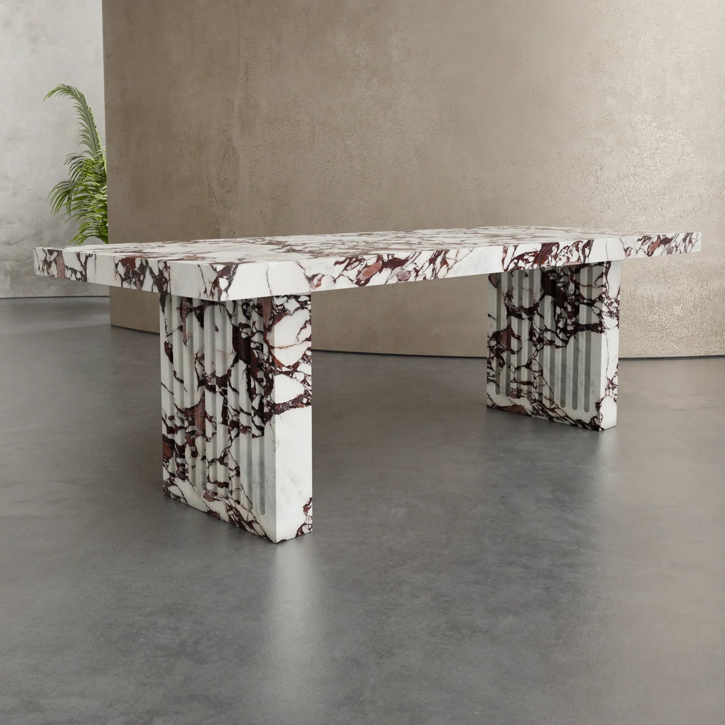 Siena marble dining table by Eden Stone Designs luxury red veined marble dining table with sculptural fluted base