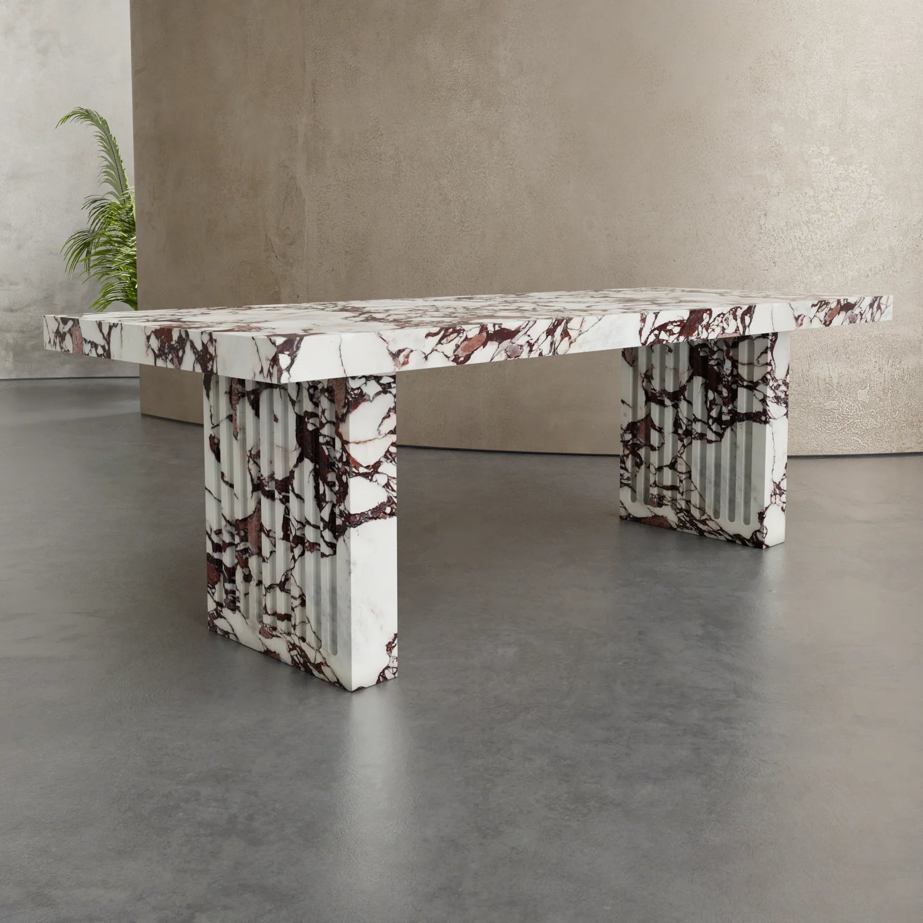 Siena marble dining table by Eden Stone Designs luxury red veined marble dining table with sculptural fluted base