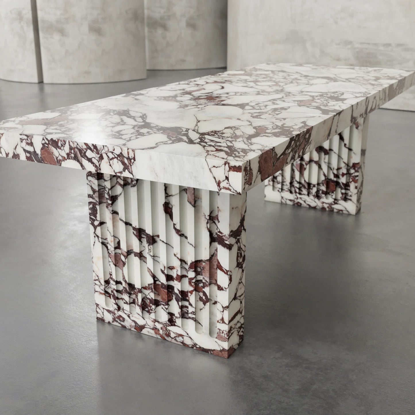 Siena marble dining table by Eden Stone Designs luxury natural marble dining table with dramatic red veining and sculptural fluted base