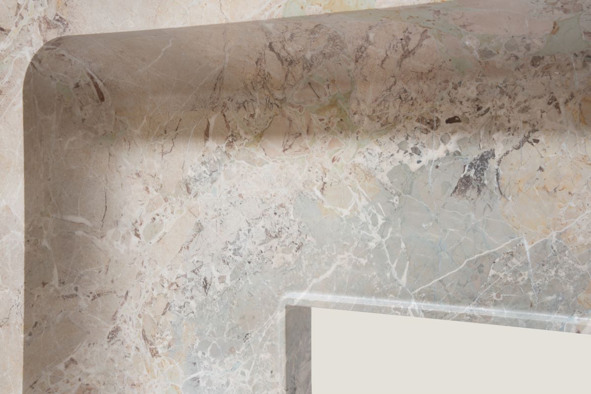 Natural marble texture detail from Giacomo fireplace by Eden Stone Designs