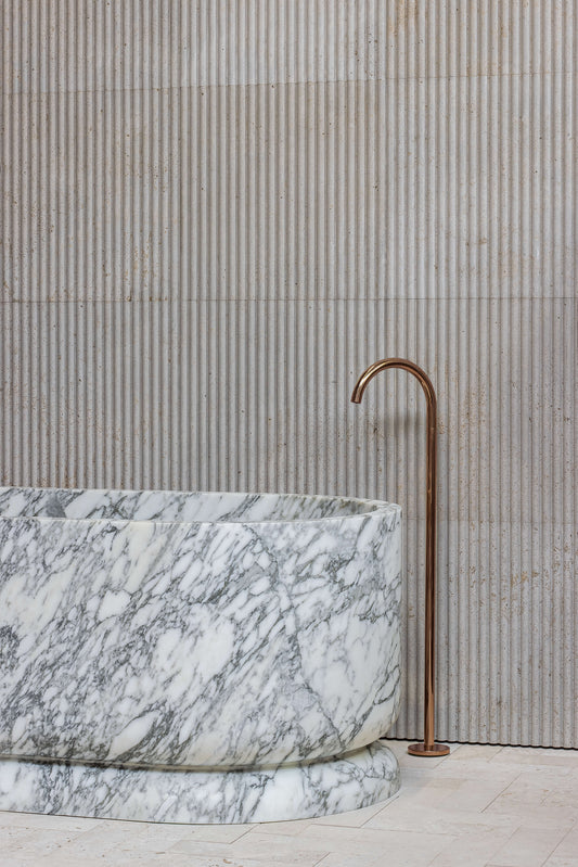 Grosseto marble freestanding bathtub detail by Eden Stone Designs