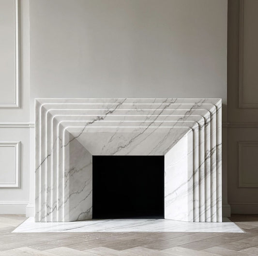 Verona marble fireplace surround in Carrara marble