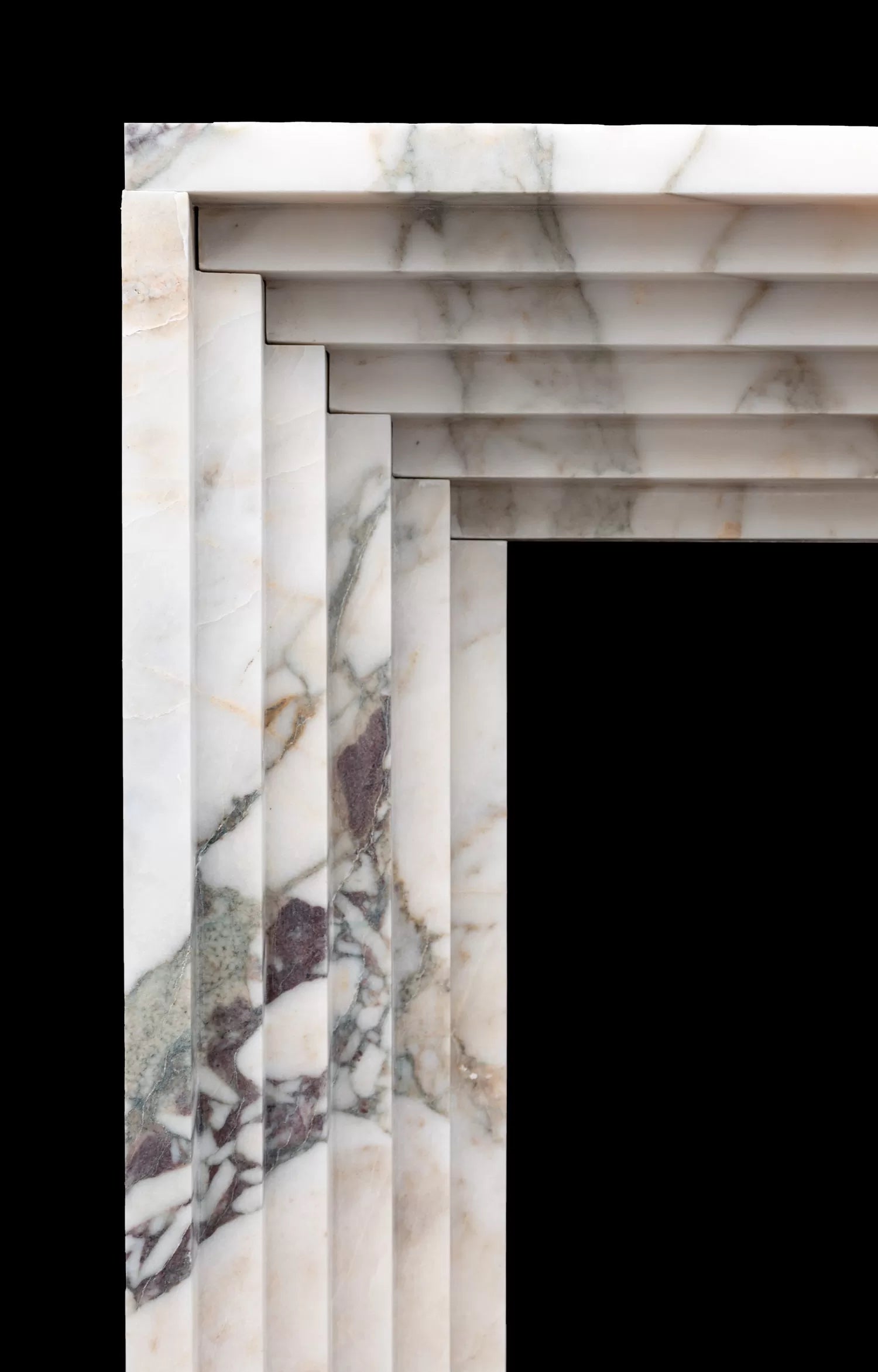Matera marble fireplace detail carved stone surround natural marble veining