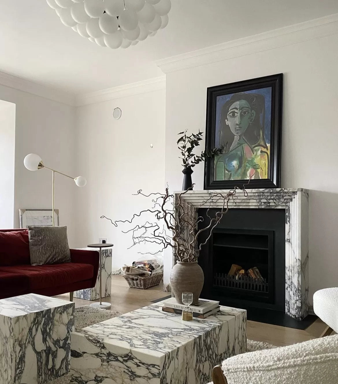 Matera marble fireplace surround in designer living room interior luxury stone fireplace