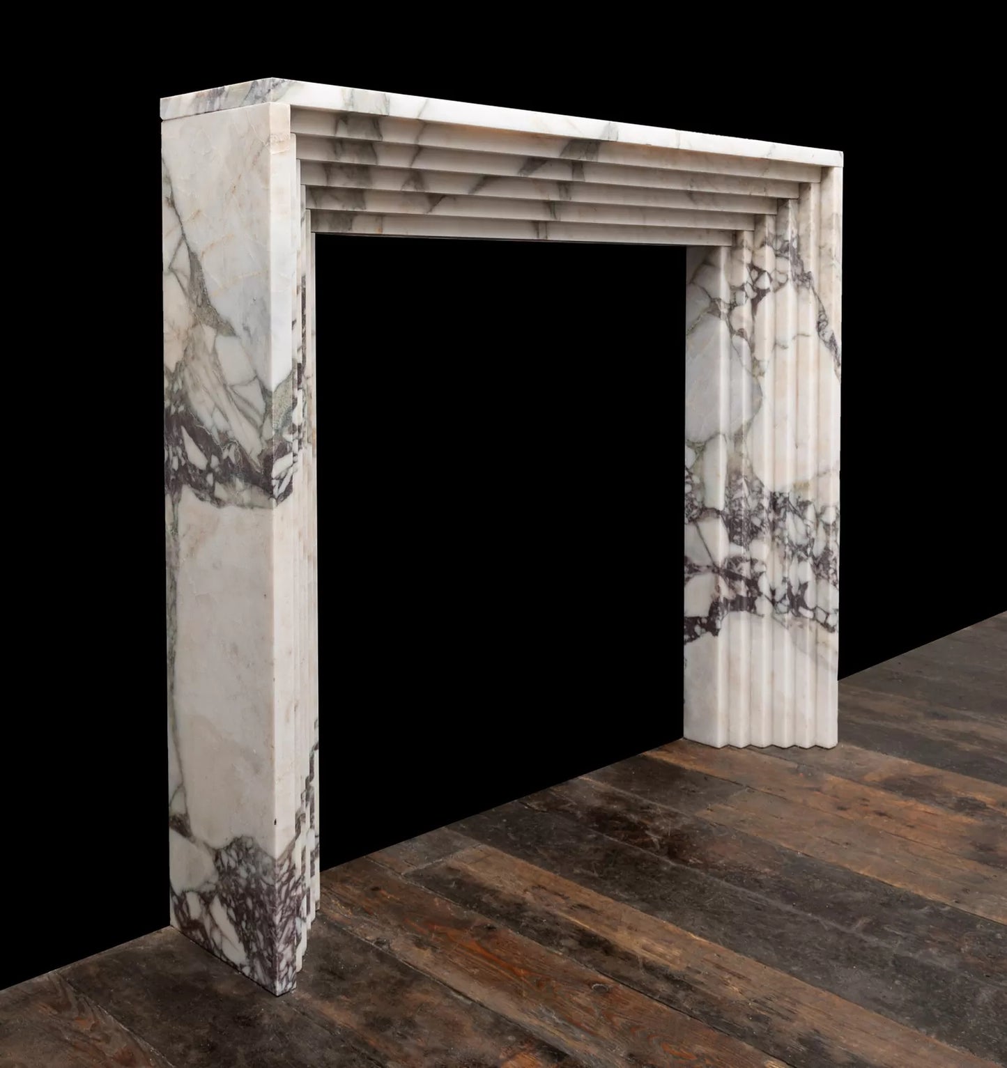 Matera marble fireplace surround side view luxury carved stone fireplace