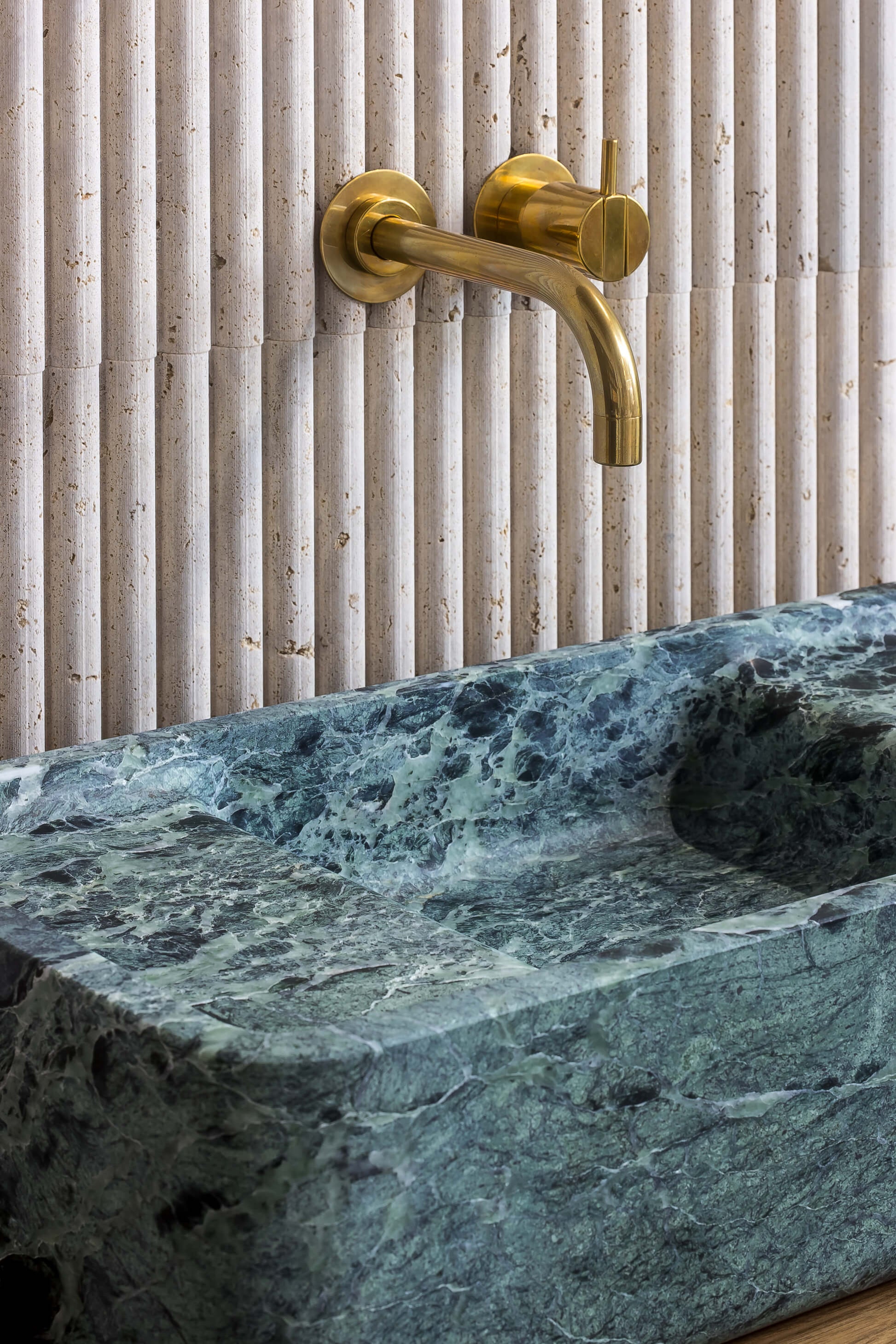 luxury green marble sink Verde Alpi bathroom wall faucet designer stone basin Milan Eden Stone Designs