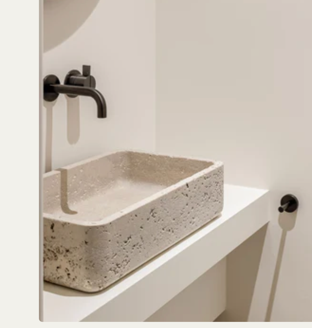 high end travertine stone sink minimalist bathroom custom vanity Milan Eden Stone Designs