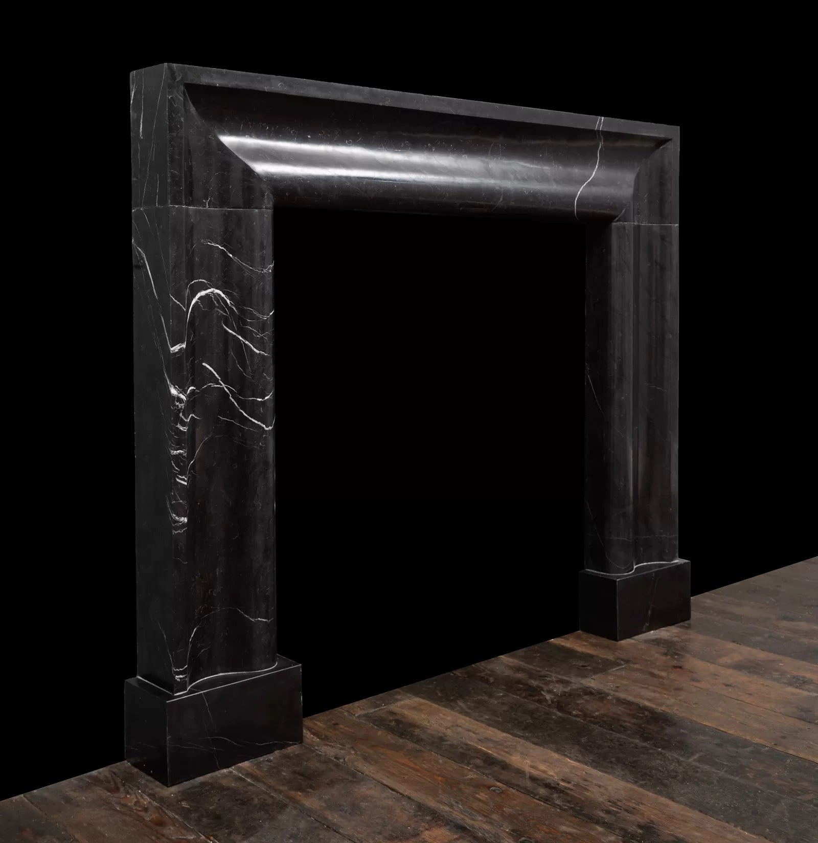 Naples black marble fireplace surround by Eden Stone Designs