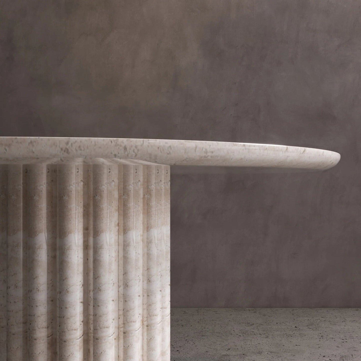 Detail of Palermo round beige marble dining table with sculptural fluted marble pedestal base by Eden Stone Designs