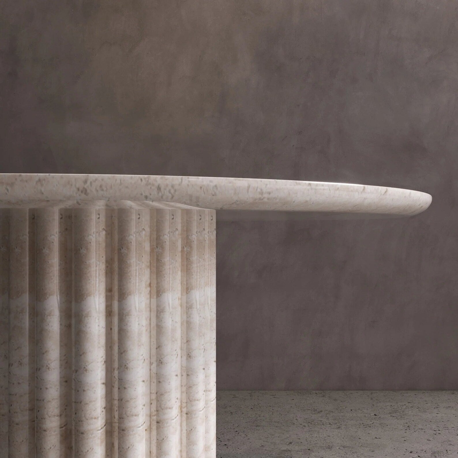 Detail of Palermo round beige marble dining table with sculptural fluted marble pedestal base by Eden Stone Designs