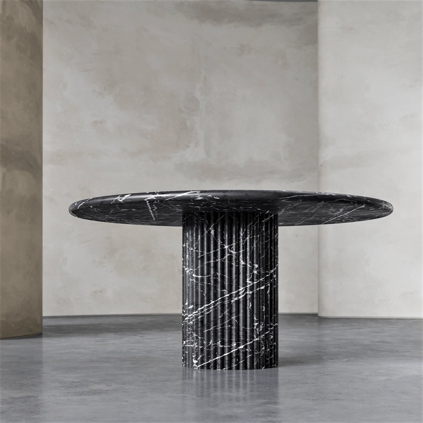Palermo round black marble dining table with fluted marble pedestal base by Eden Stone Designs
