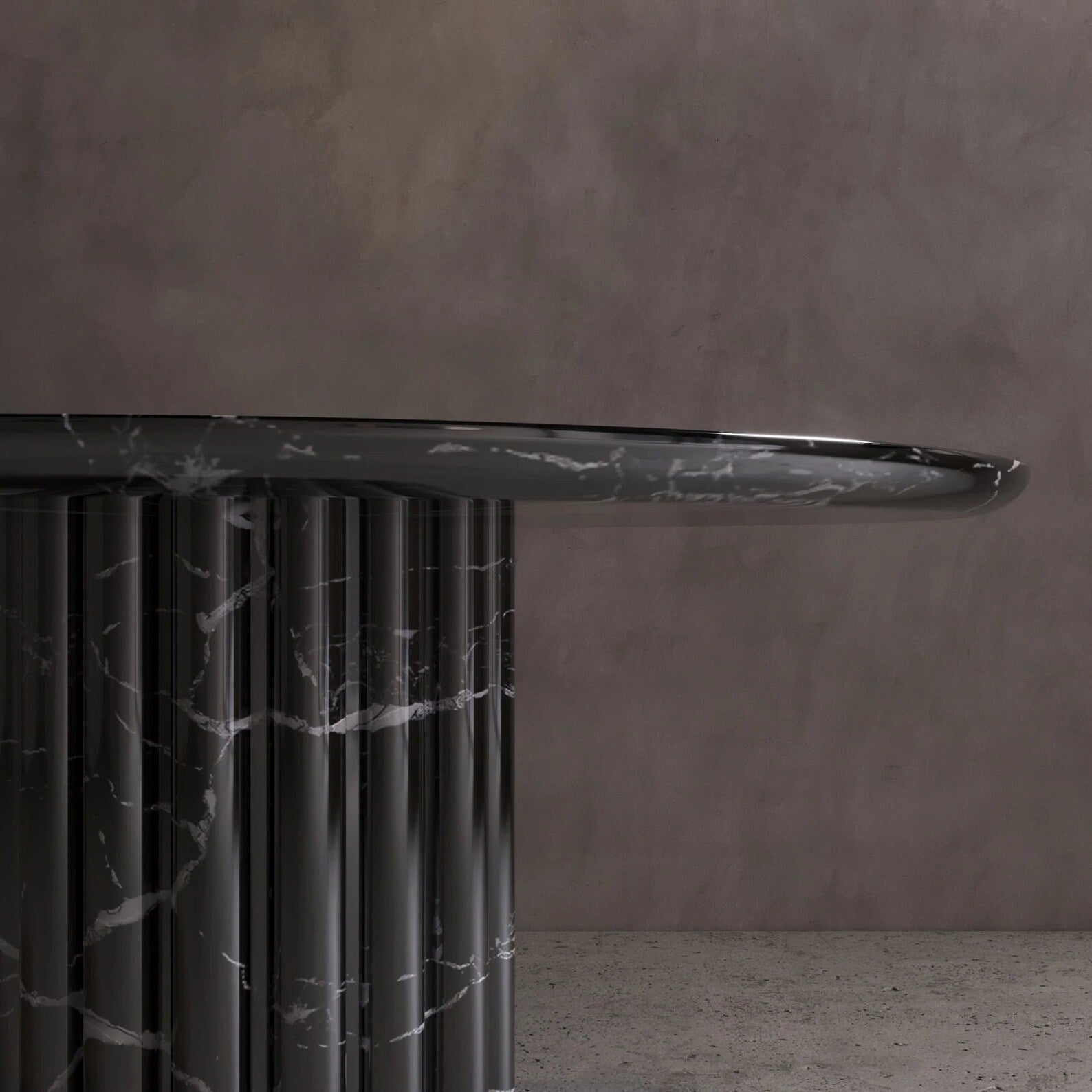 Detail of Palermo round black marble dining table with sculptural fluted marble pedestal by Eden Stone Designs