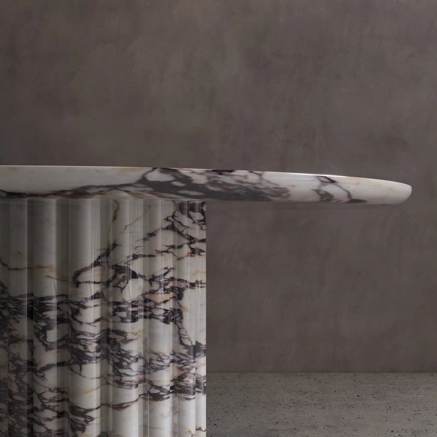 Detail of Palermo round veined marble dining table with sculptural fluted marble pedestal base by Eden Stone Designs