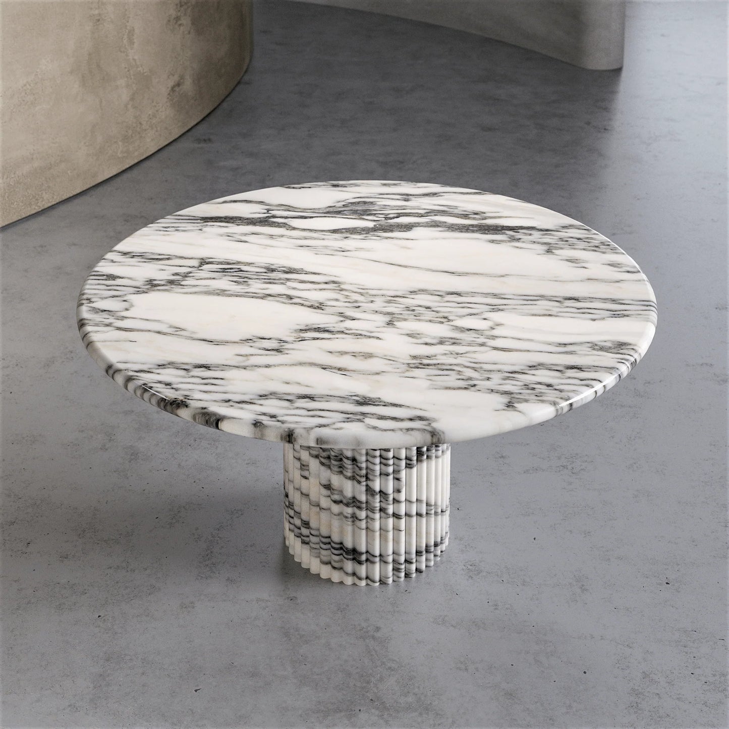 Top view of Palermo round white marble dining table with natural Calacatta marble surface by Eden Stone Designs