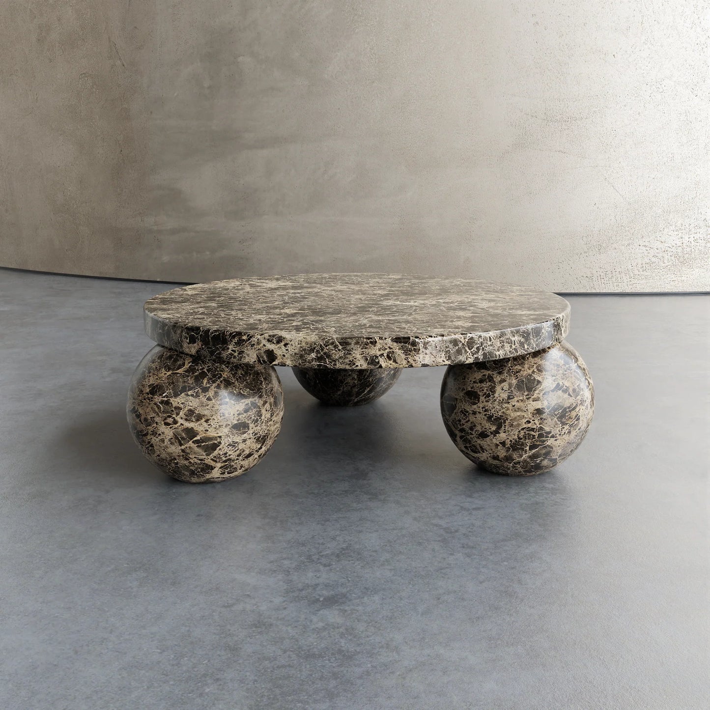Piccolo Dark Emperador marble coffee table with sculptural sphere base