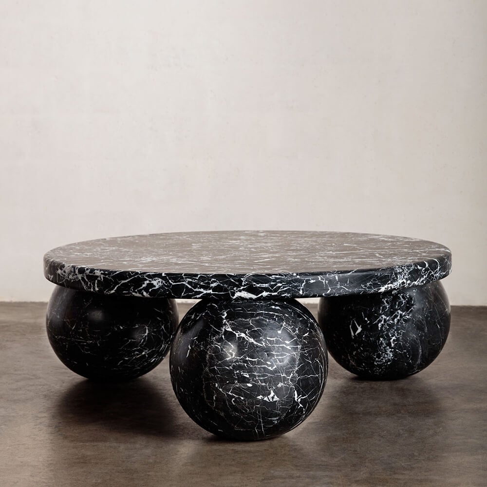 Piccolo Nero Marquina black marble coffee table with sculptural sphere base