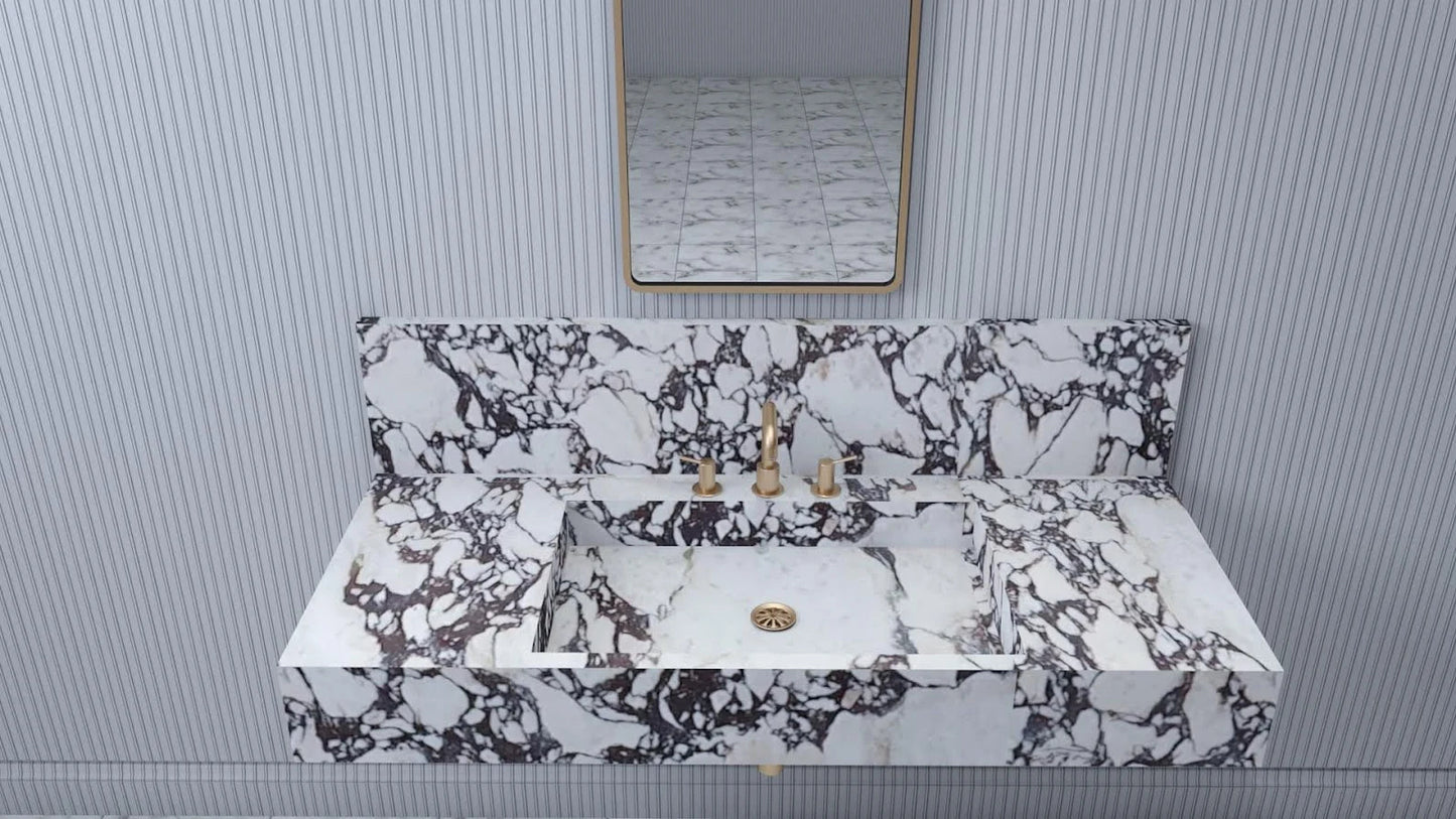 Rome marble sink front view with integrated basin and bold natural veining