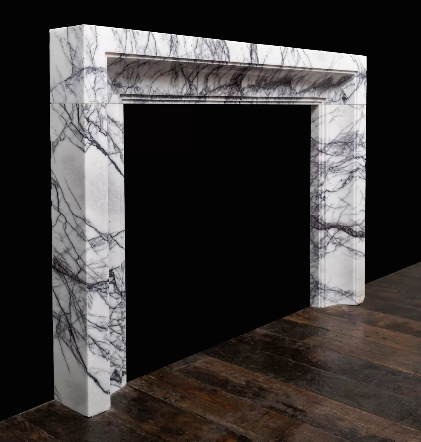 Tivoli Carrara marble fireplace surround angled view luxury marble fireplace Eden Stone Designs