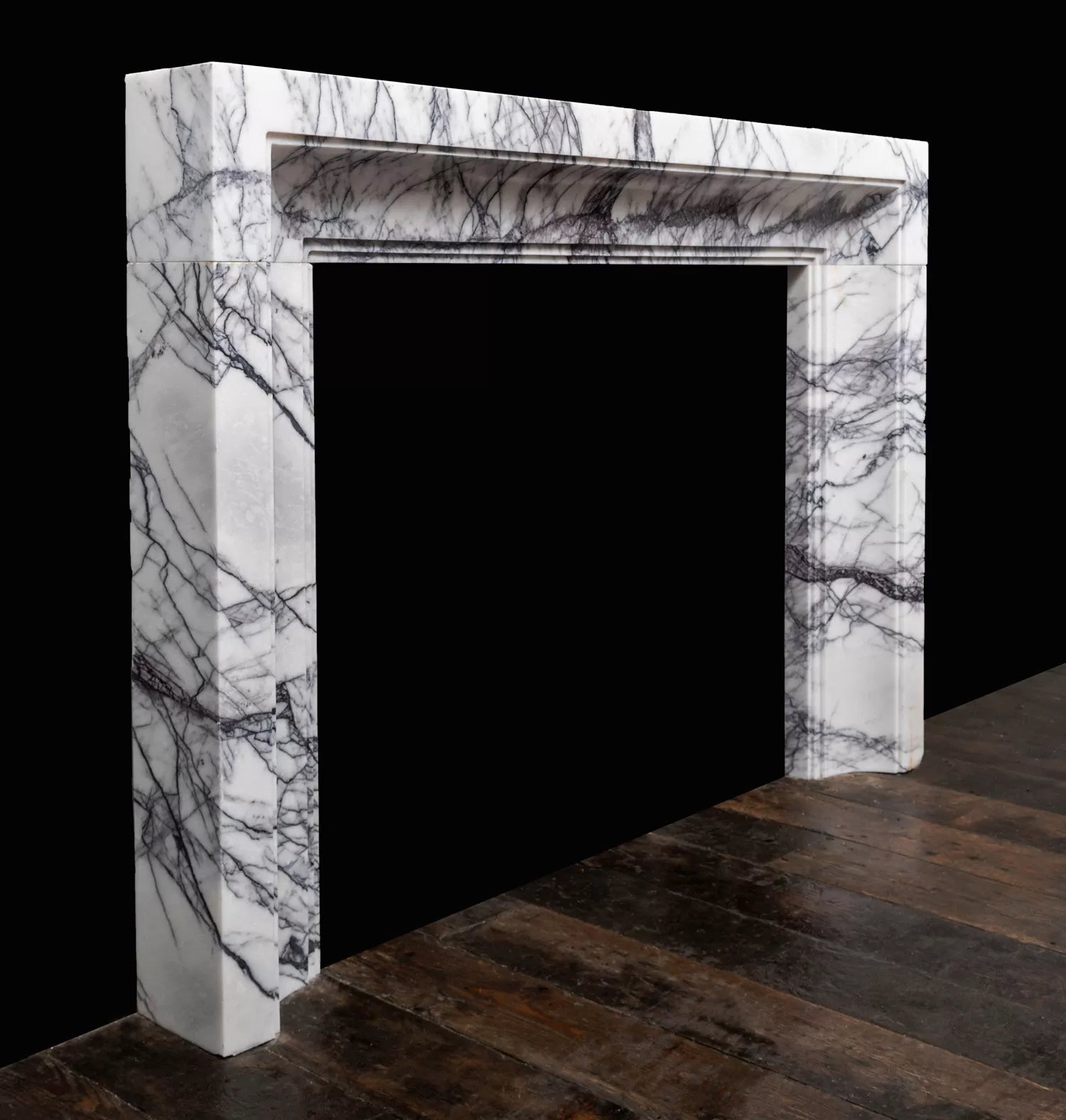 Tivoli Carrara marble fireplace surround angled view luxury marble fireplace Eden Stone Designs