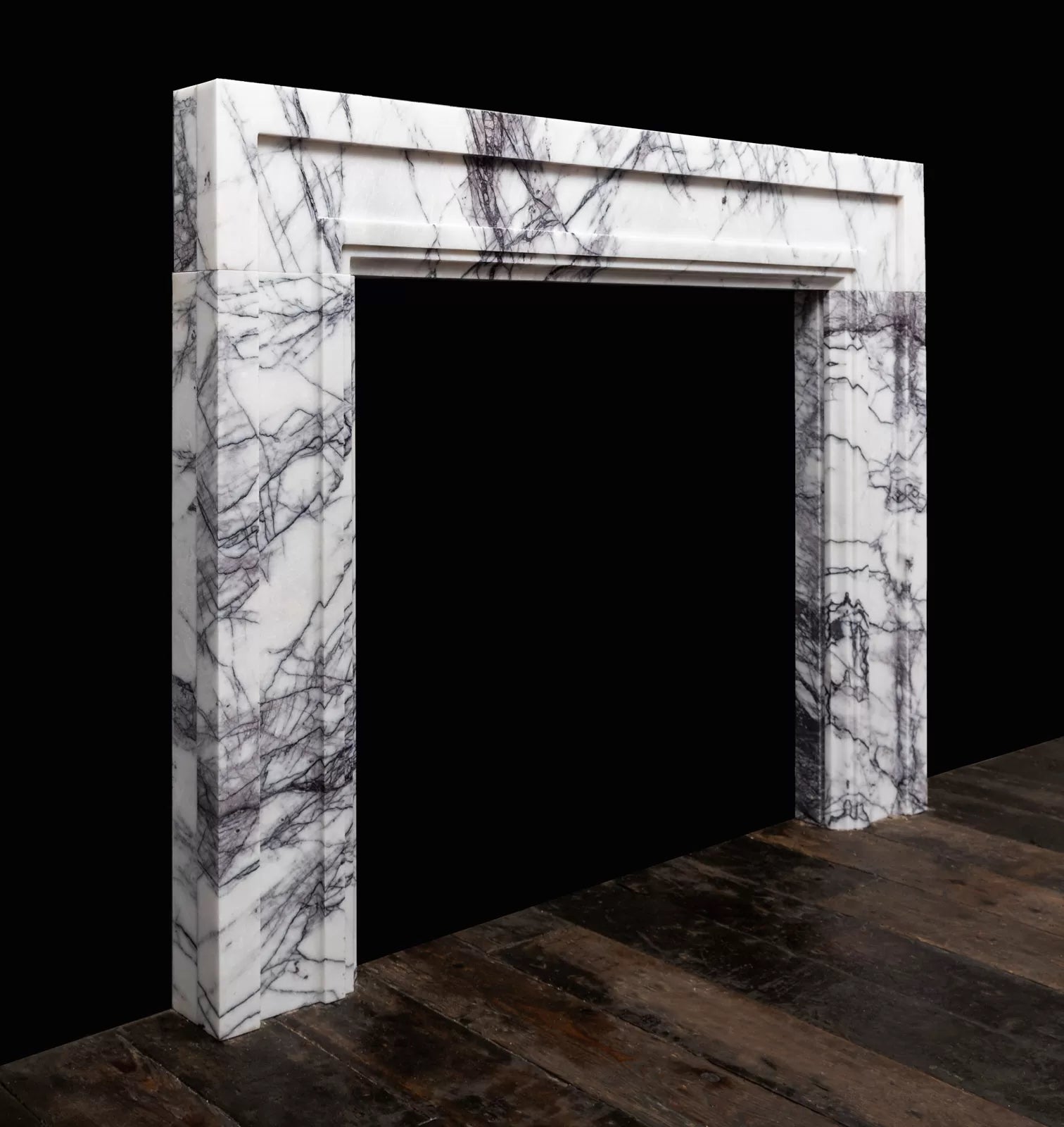Tivoli Carrara marble fireplace surround angled view luxury stone fireplace Eden Stone Designs