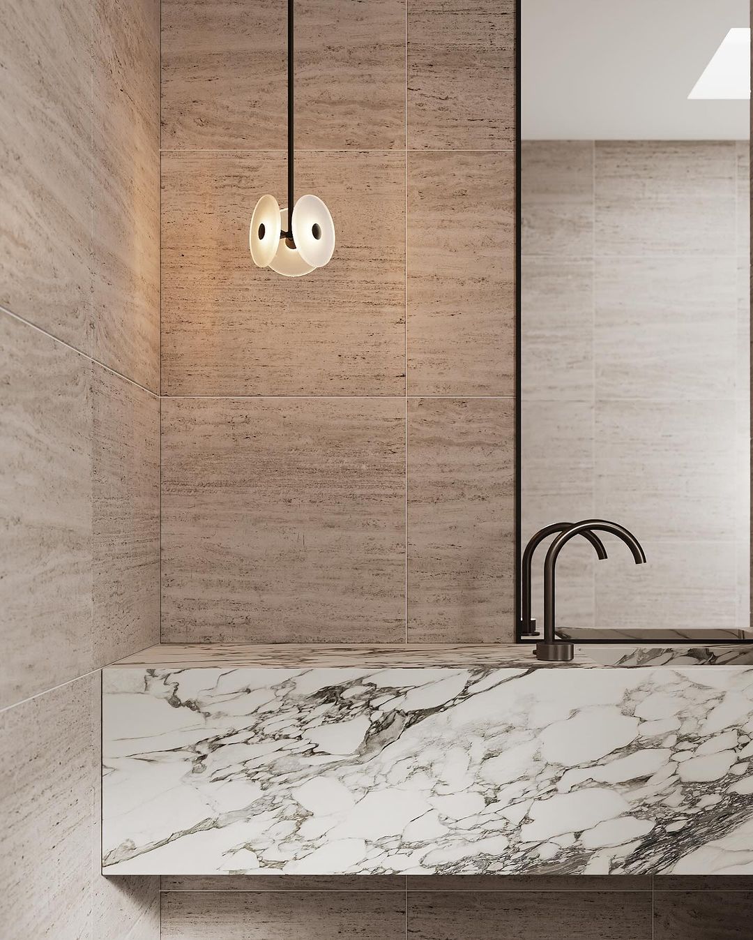 Toscana marble sink integrated in modern bathroom with natural stone walls and minimalist faucet design