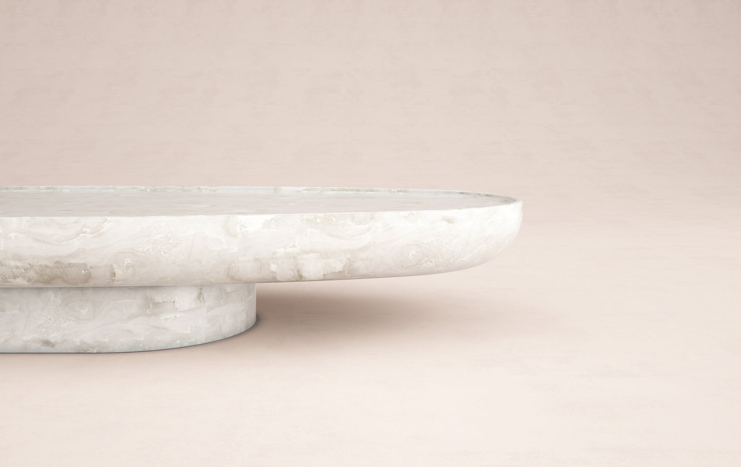 Side detail of Trento oval onyx coffee table by Eden Stone Designs showcasing natural stone texture and sculptural pedestal base