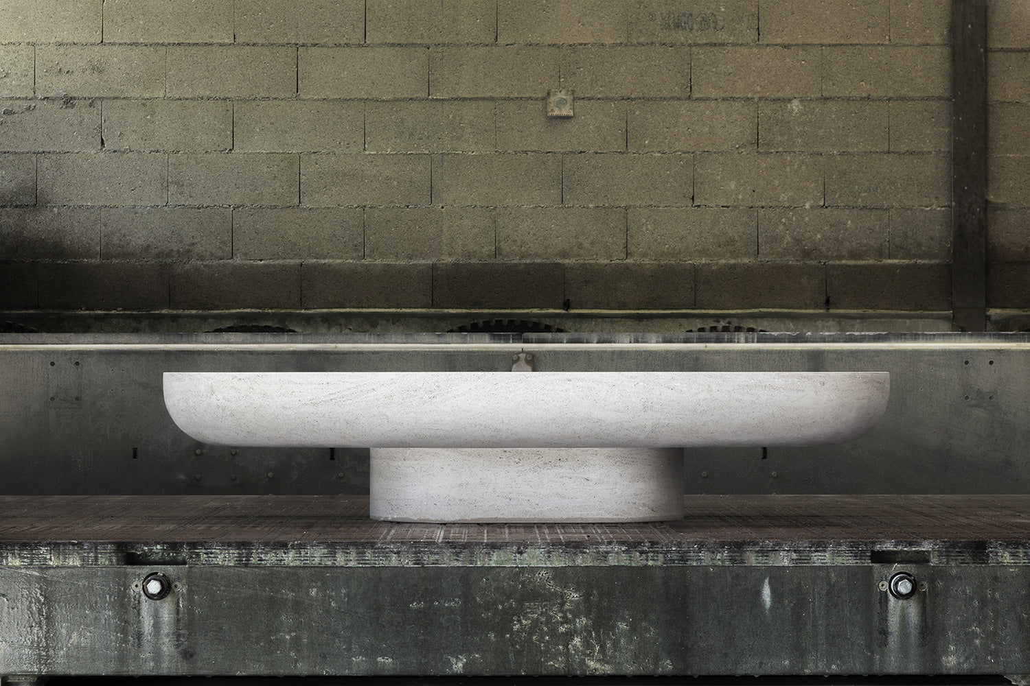 Trento marble coffee table by Eden Stone Designs showcased in a stone workshop environment