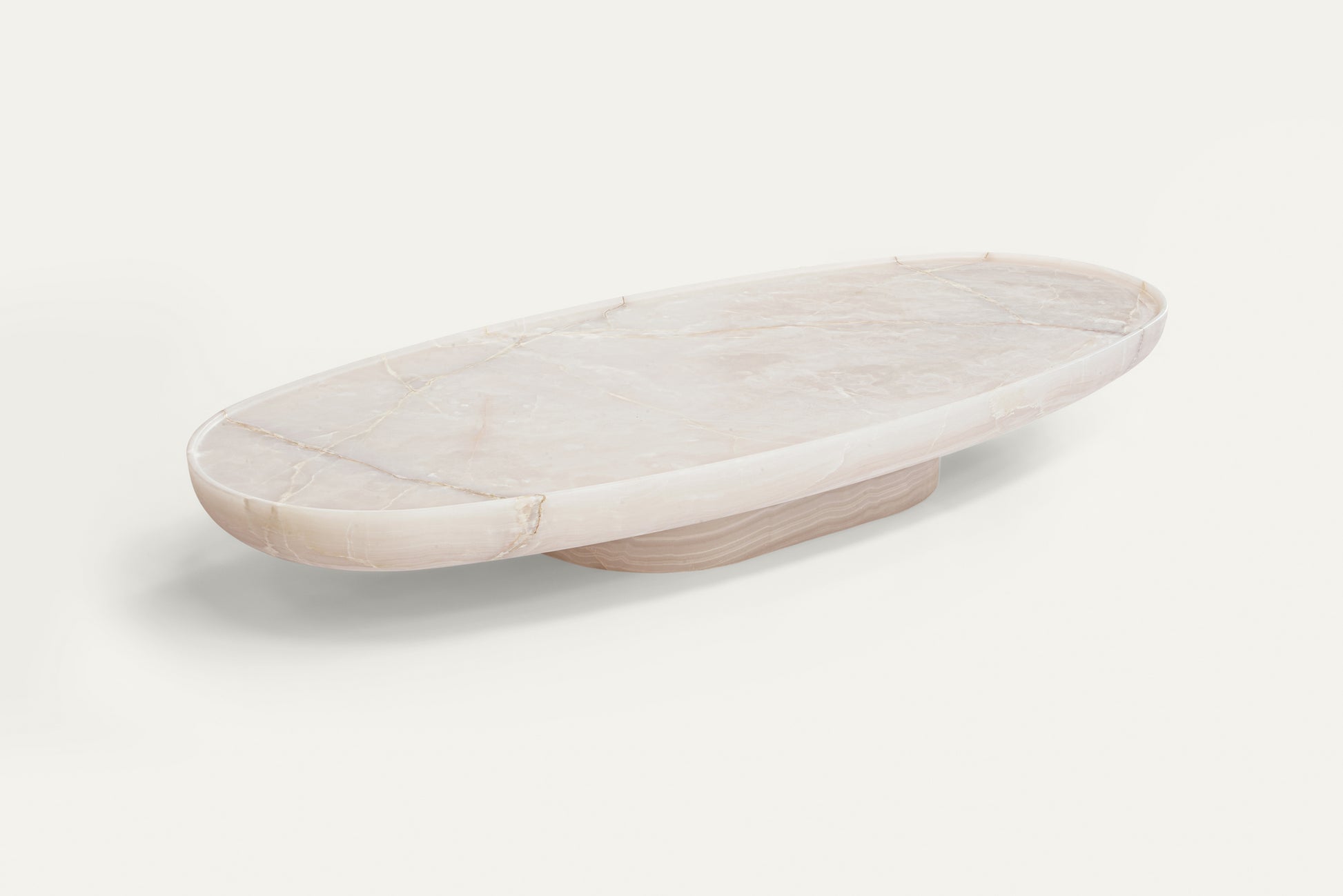 Trento onyx marble coffee table by Eden Stone Designs, luxury oval natural stone coffee table with sculptural base