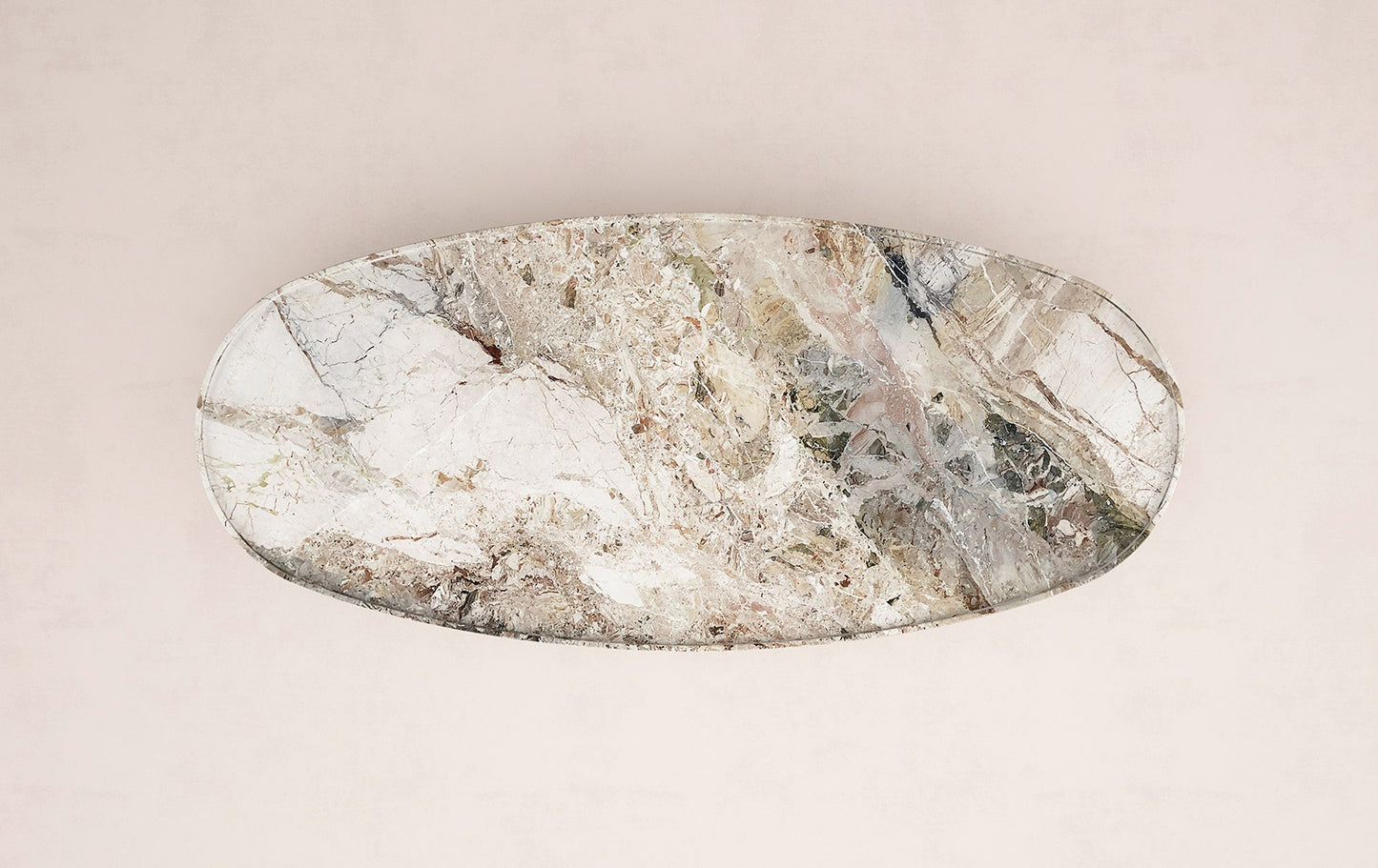 Top view of Trento oval marble coffee table by Eden Stone Designs showing natural stone pattern