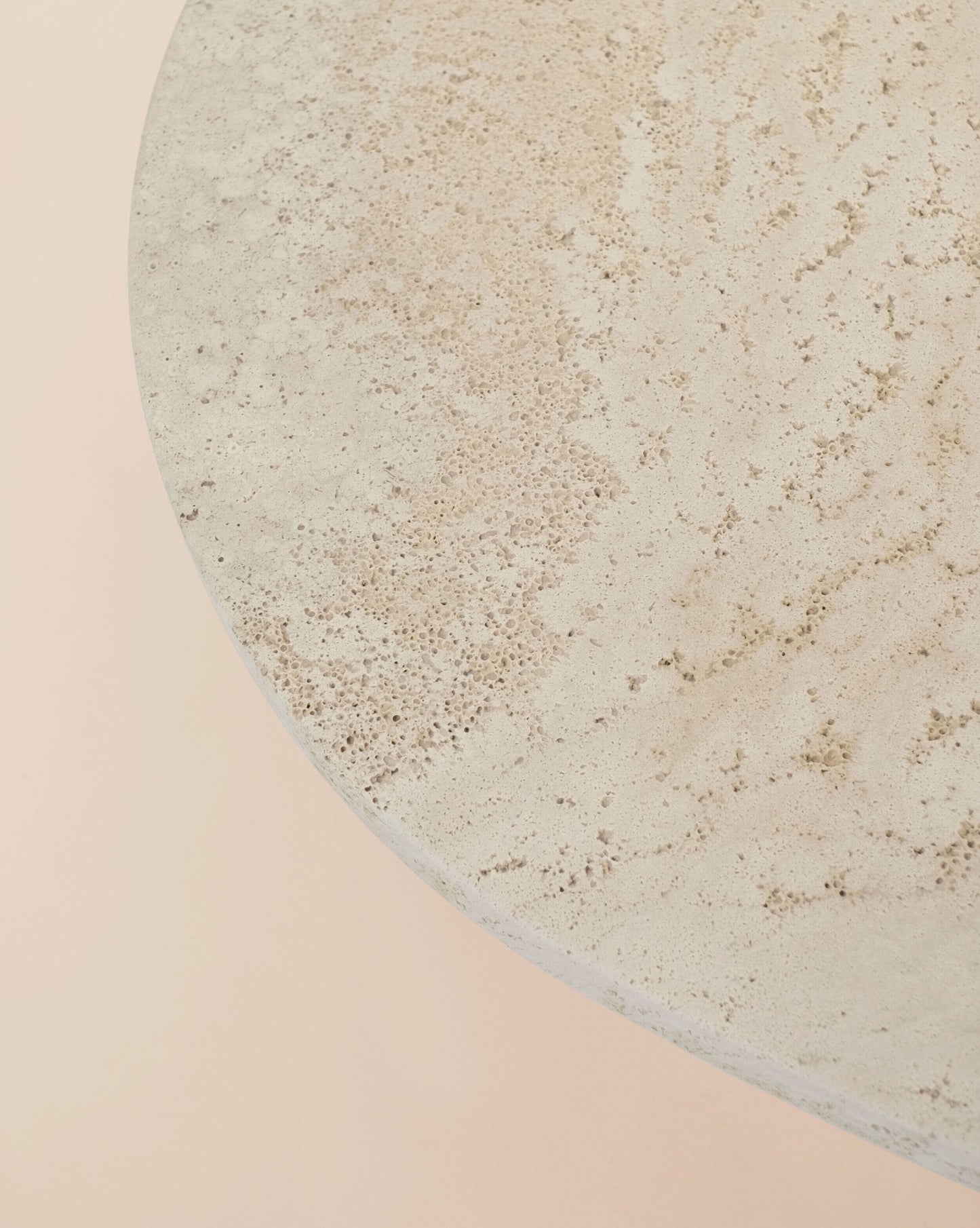 Detail of natural travertine stone surface on the Trento coffee table by Eden Stone Designs showcasing organic texture and luxury stone craftsmanship