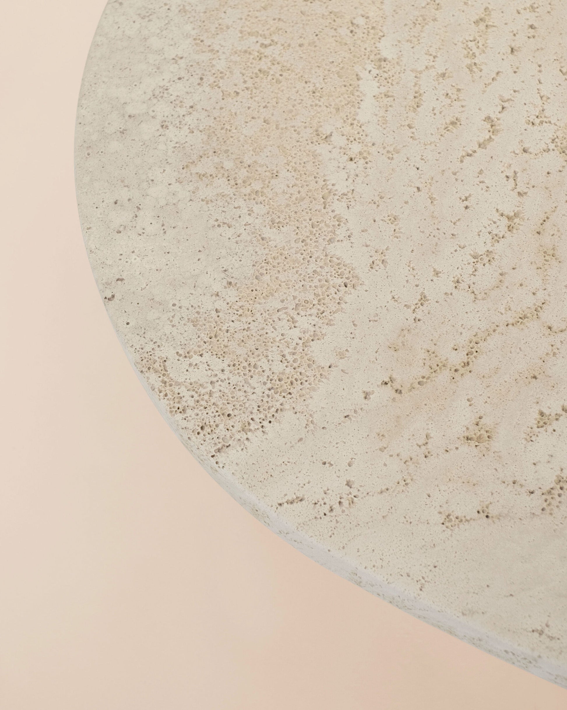 Detail of natural travertine stone surface on the Trento coffee table by Eden Stone Designs showcasing organic texture and luxury stone craftsmanship