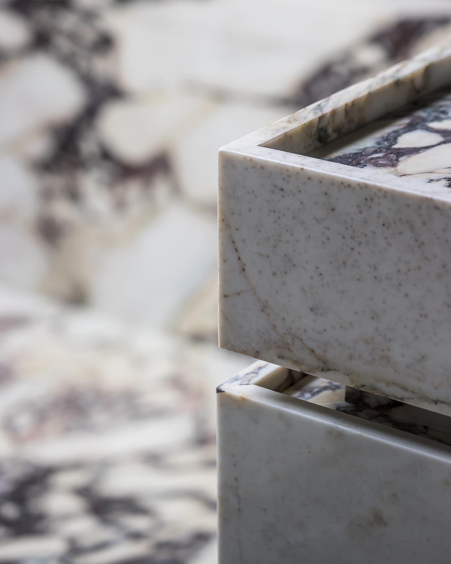 Close-up of Venice light marble vanity showing clean stone edge detailing and subtle natural veining