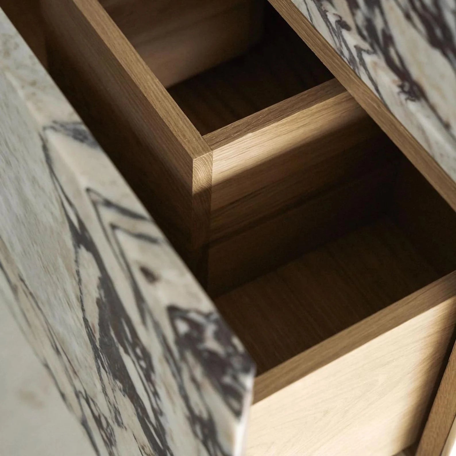 Close up of Venice marble vanity drawer interior showing solid wood construction and craftsmanship