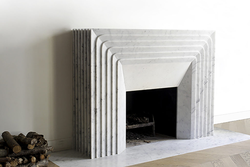 Verona Carrara marble fireplace in contemporary interior