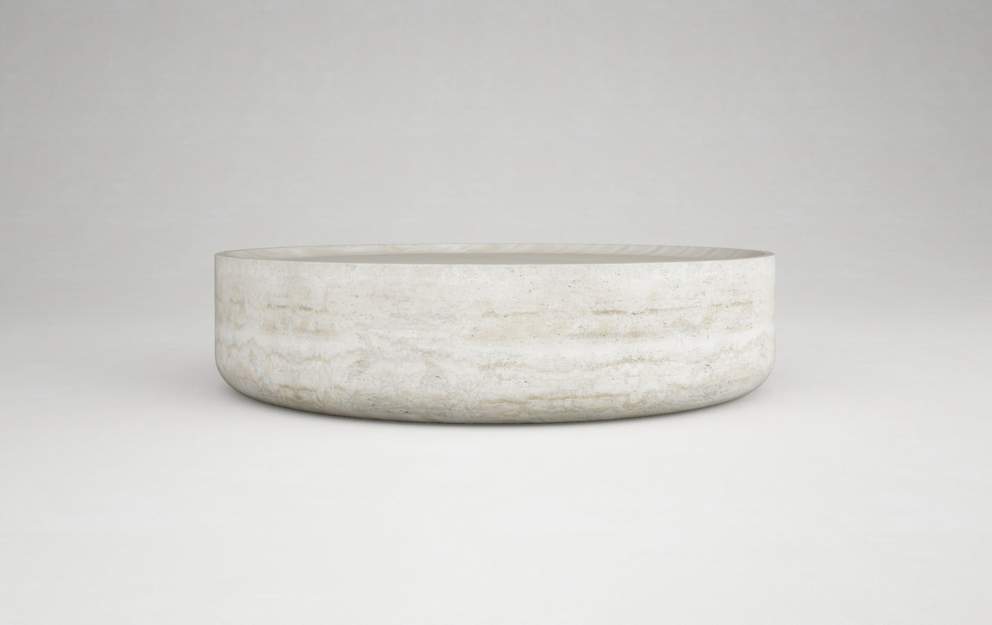 Vicenza round travertine coffee table natural stone sculptural design Eden Stone Designs