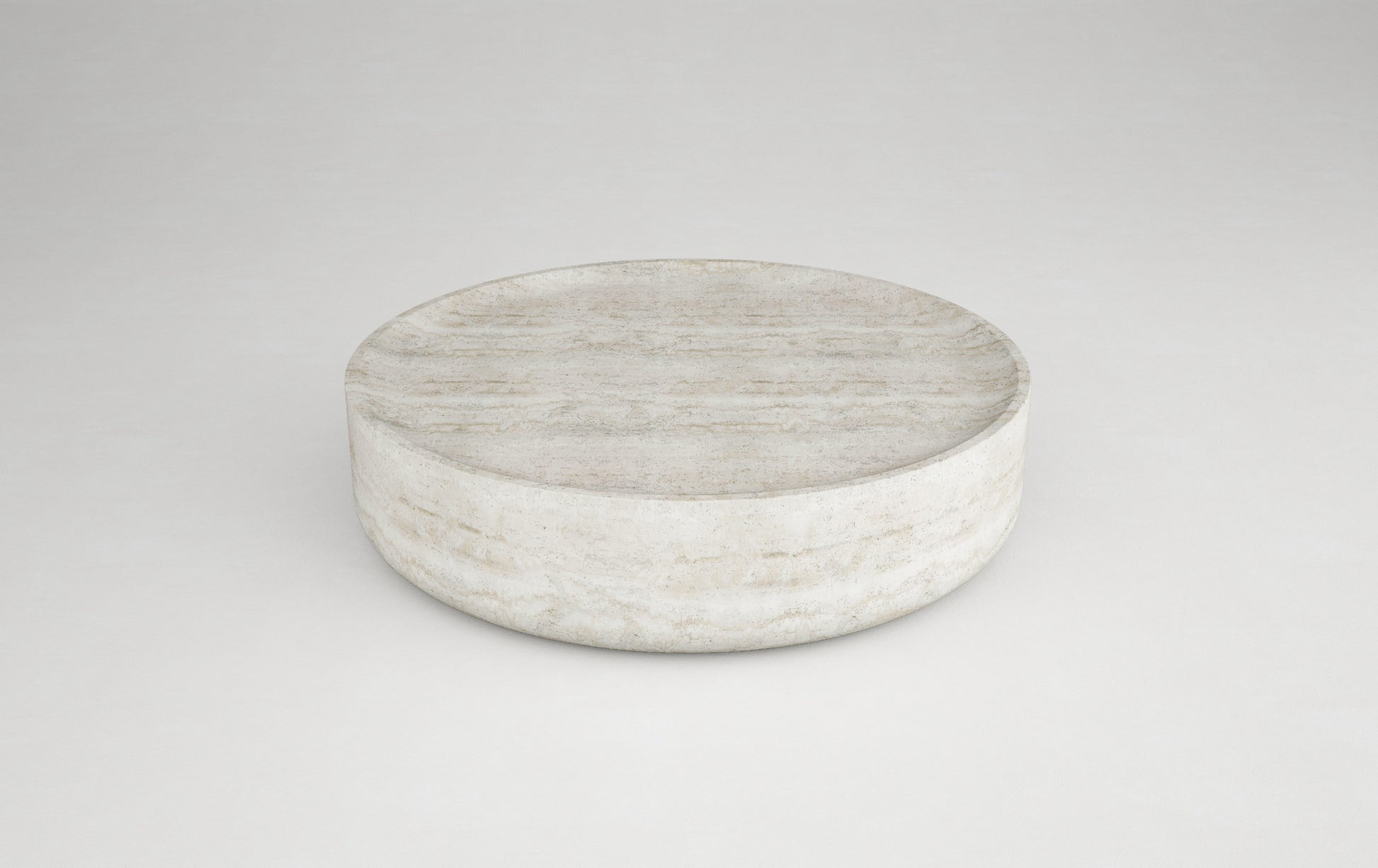 Vicenza round travertine coffee table sculptural natural stone design Eden Stone Designs
