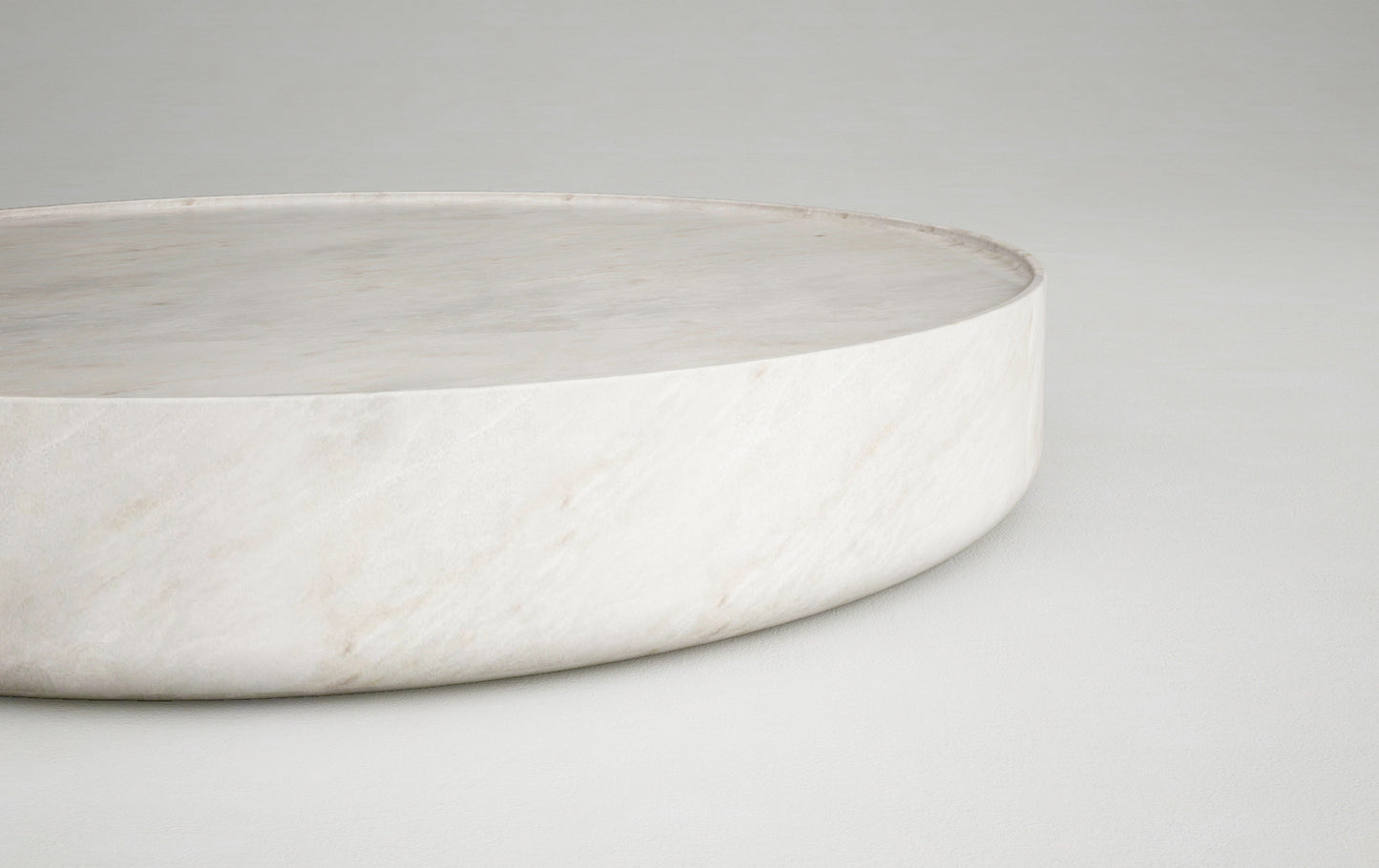 Vicenza round travertine coffee table edge detail natural stone surface Eden Stone Designs